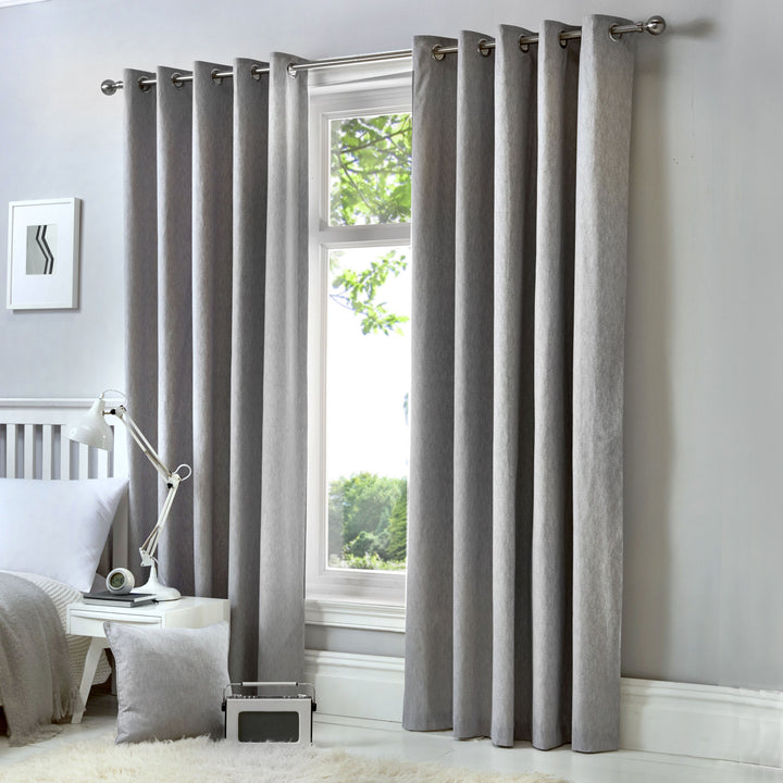 Cannes Pair of Eyelet Curtains by Fusion in Silver